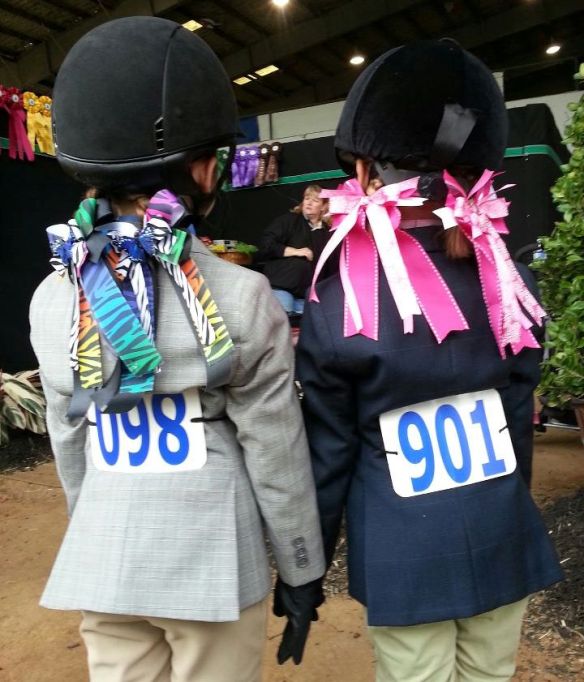 The girls showing off their bows.