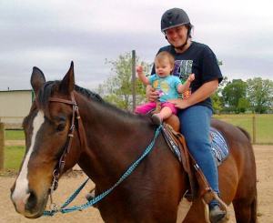 Kendyll FINALLY getting a turn! She says she was born to ride!