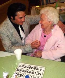 Elvis singing to momma.