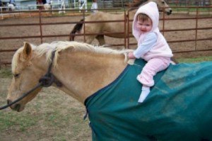 Jordyn totally at home on pony Dusty.