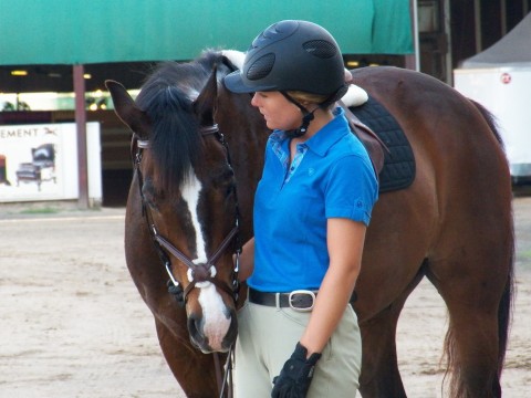 One of my favorite all time pictures of Mickey and Lauren. She is giving him a little pep talk before a jumping class.