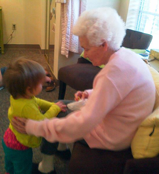 My mother and her great granddaughter, Kendyll, having a serious conversation.
