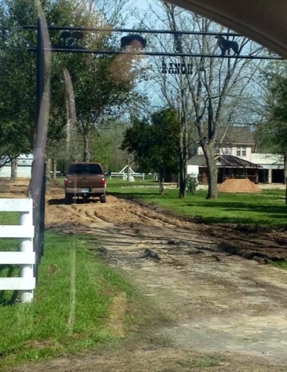 The sand and gravel being set down for our new driveway.