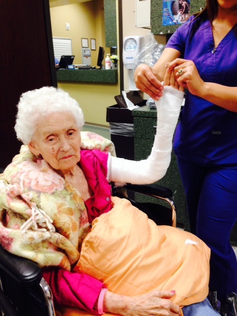 Momma getting her newest cast on.