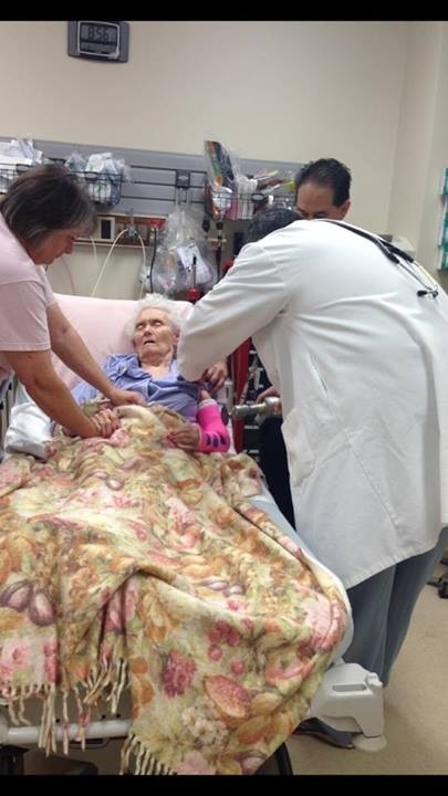 Attempting to cut the cast off.