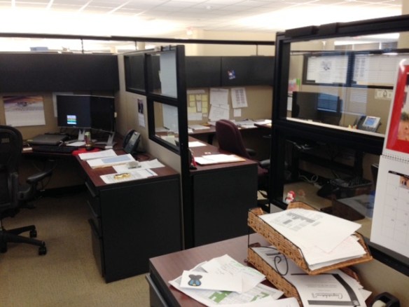 My desk-the messy one and then my co-workers-GONE.