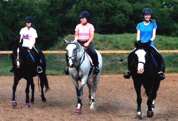 Lauren with Alex and Isabel getting ready to jump her first course in over two months.