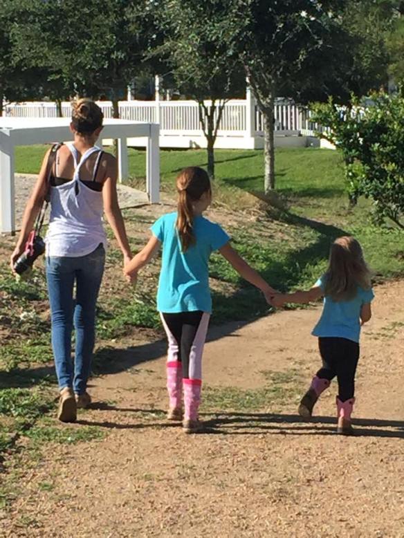Mia walking with my granddaughters, Jordyn and Kendyll