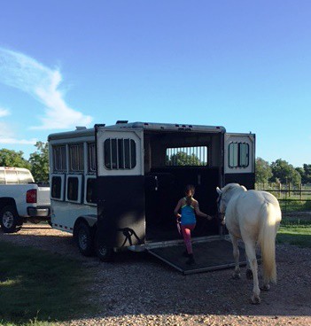 Jordyn actually loading Snow by herself headed off to camp.